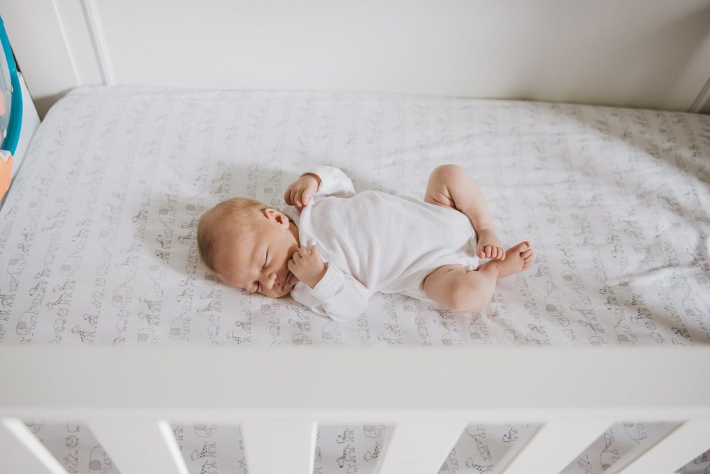 in home newborn photo of baby in nursery
