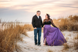 beautiful cape may maternity session with mom wearing a client closet dress